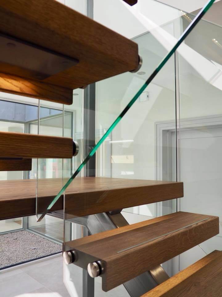 Grey Steel Spine Stairs with Glass Balustrade - Staircase Design and ...