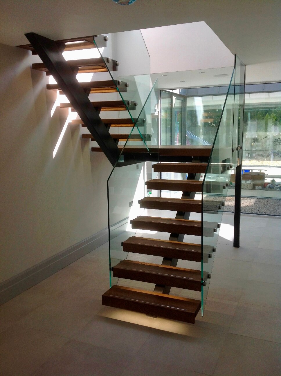 Grey Steel Spine Stairs with Glass Balustrade - Staircase Design and ...